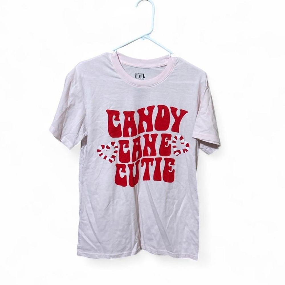 This is a light pink short-sleeve graphic tee - M - White